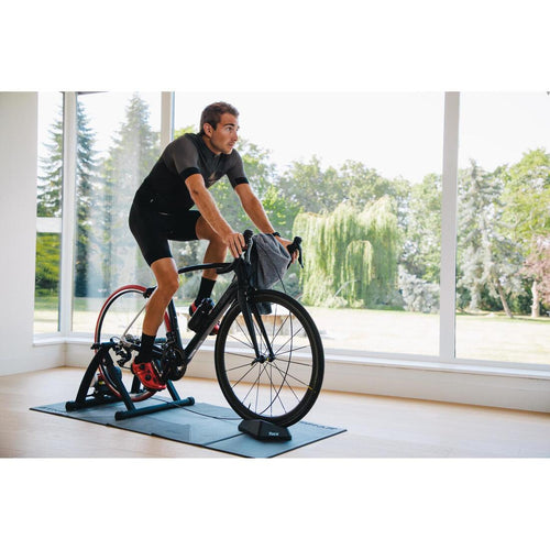 Stationary bike stand decathlon sale